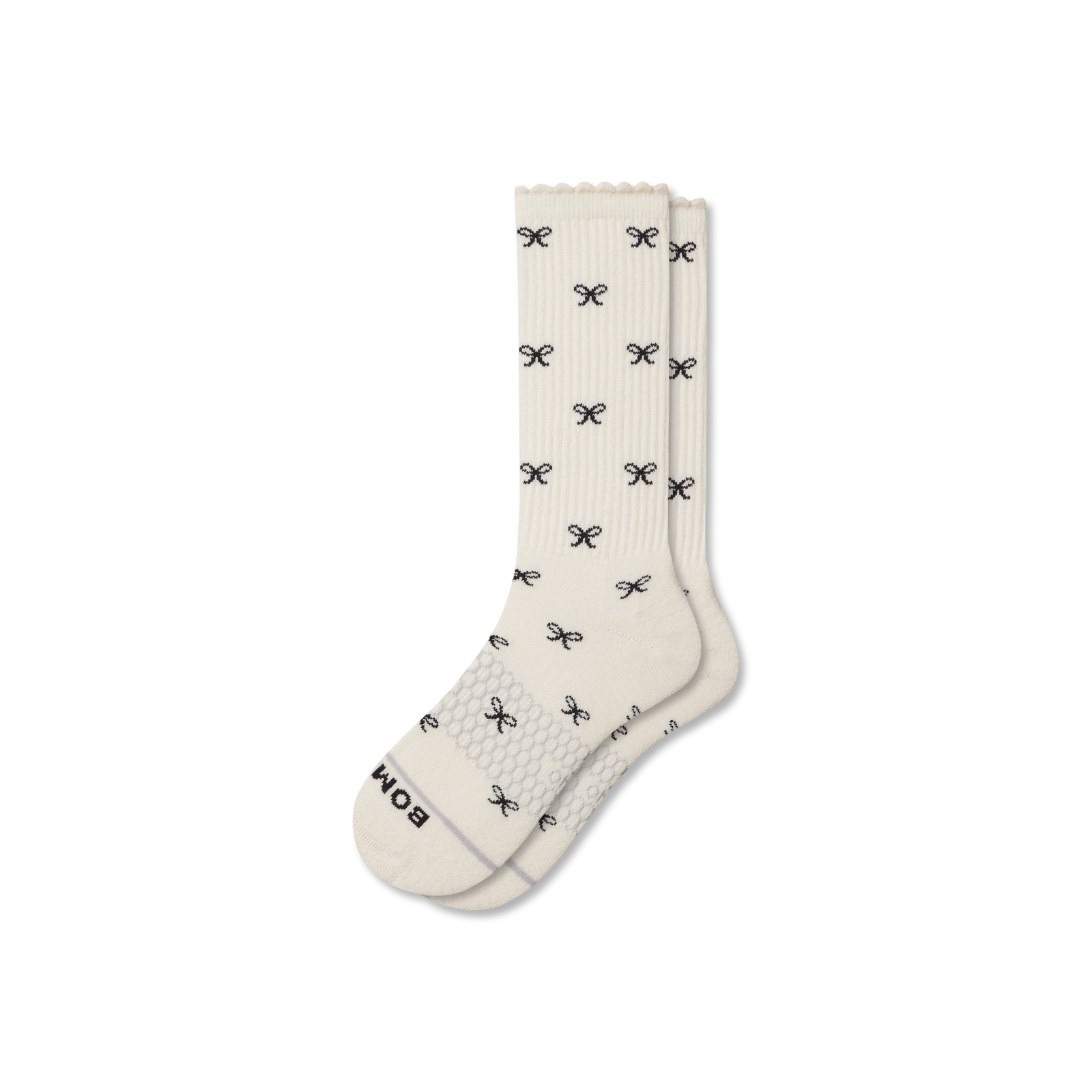 official-bombas::10040ivoryblackadultfemalelayflat1transparent.png