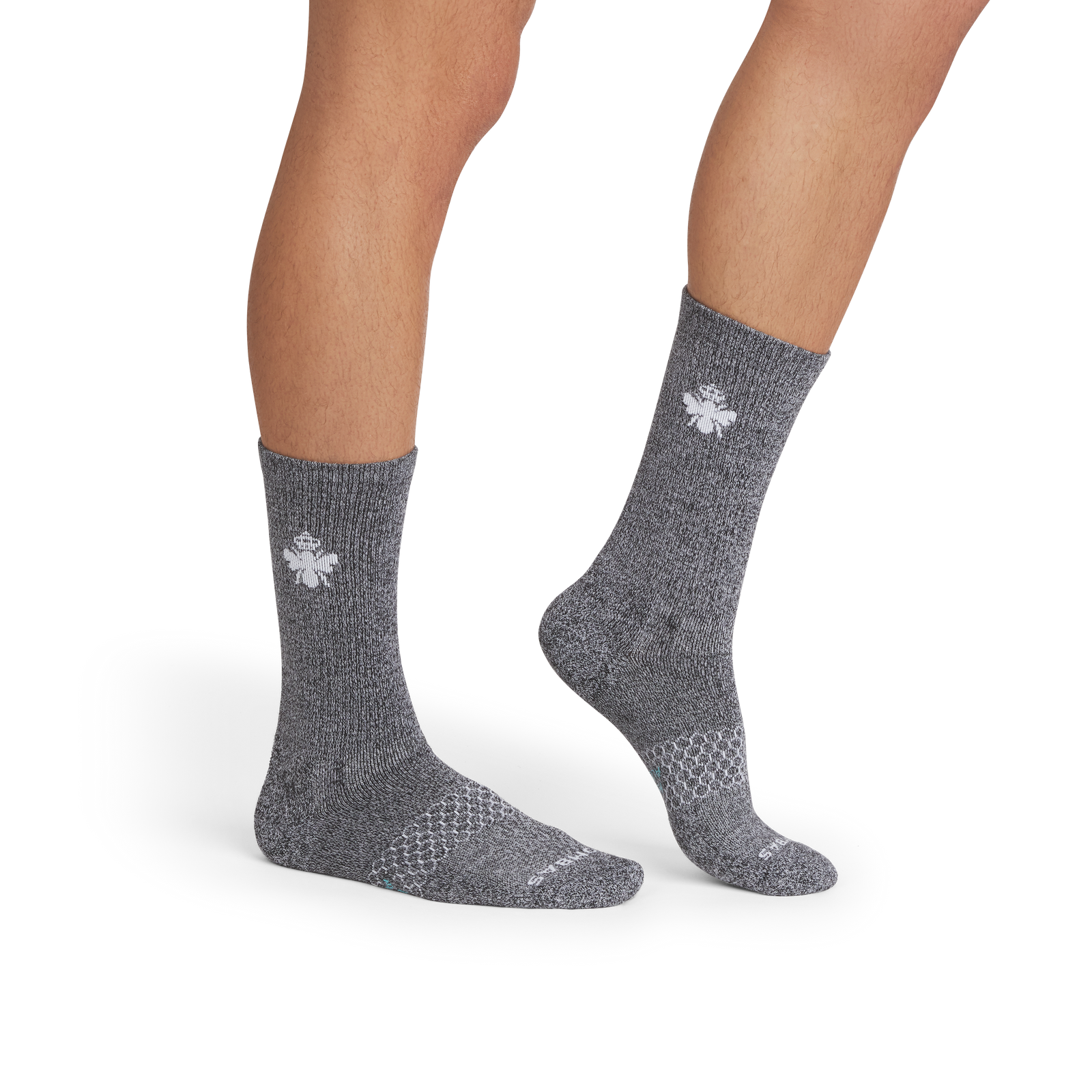 official-bombas::10341-black-white-adult-male-onmodel-2-transparent.png