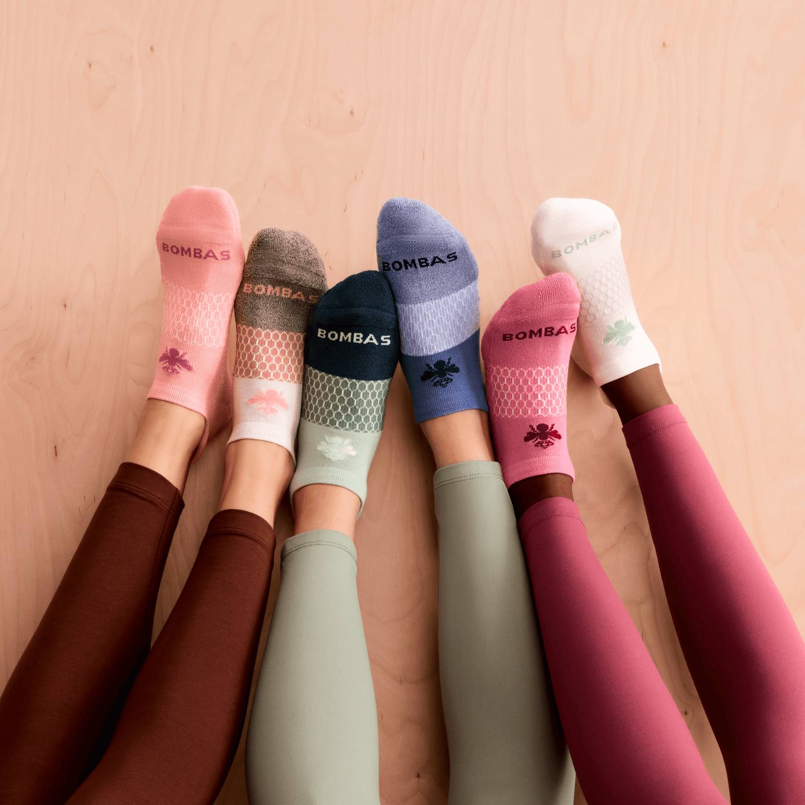 official-bombas::5745-shellpink-adult-female-onmodel-0-transparent-v3.png