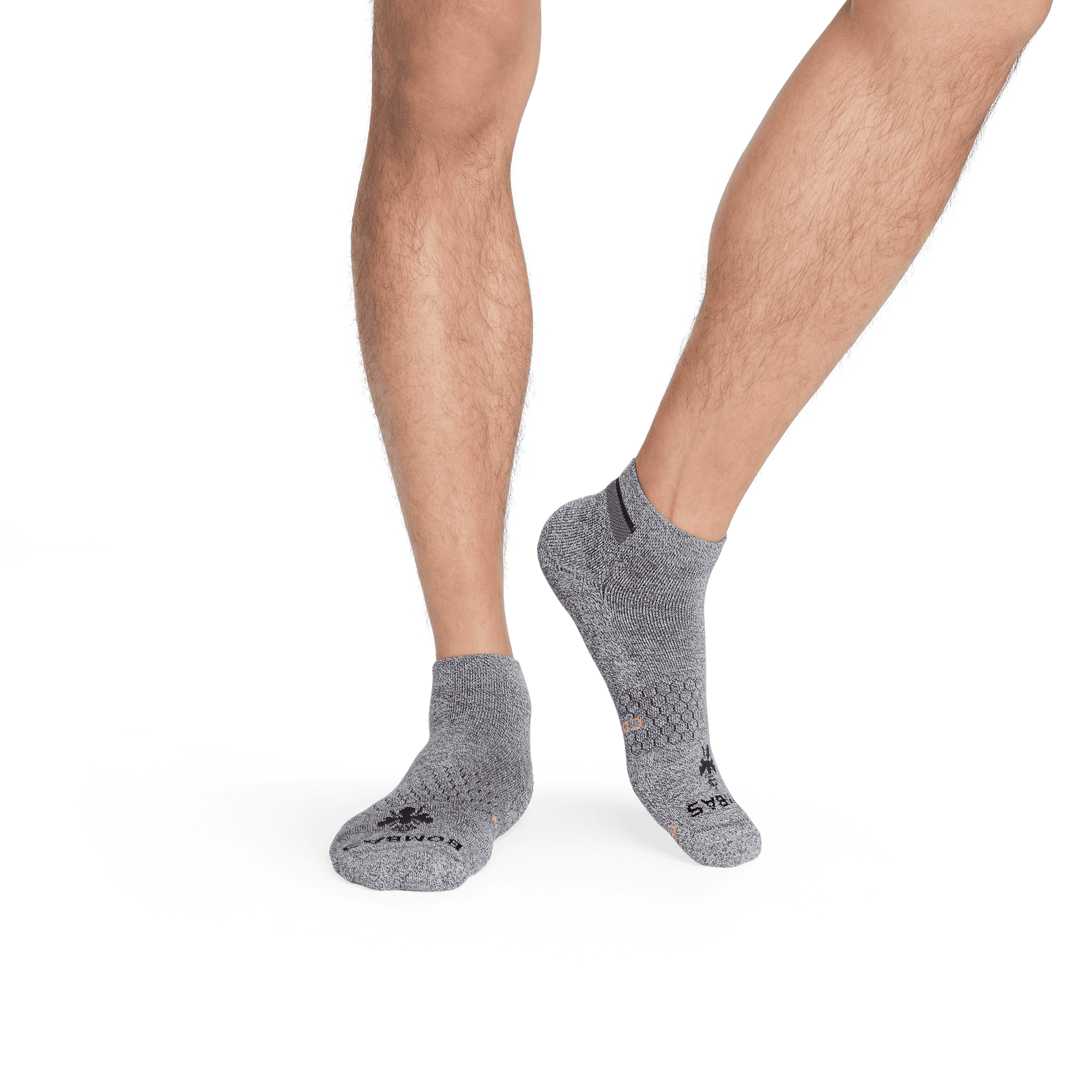 official-bombas::7672-charcoal-neonorange-adult-male-2-transparent.png