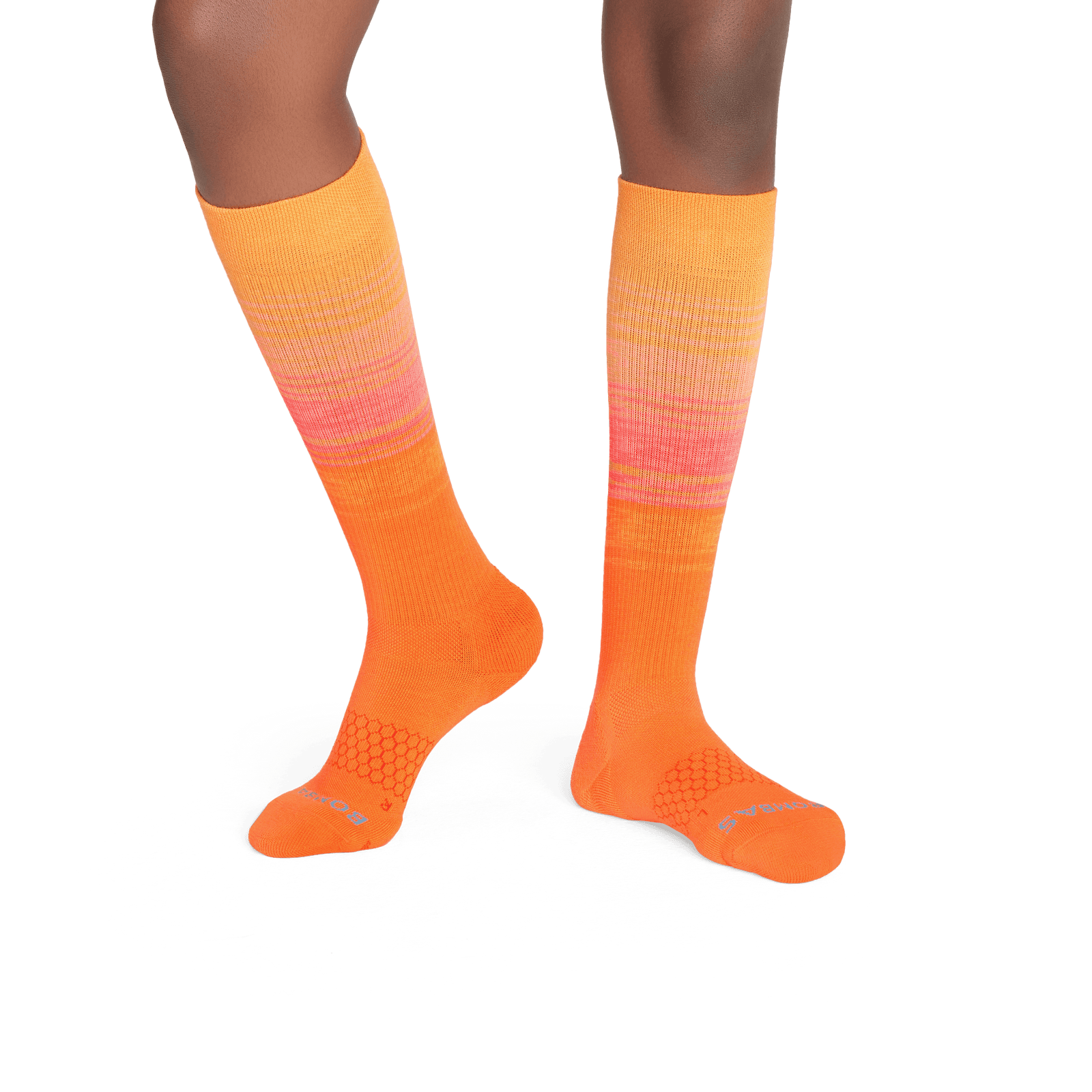 official-bombas::7764-peachcloud-signalorange-youth-unisex-2-transparent.png