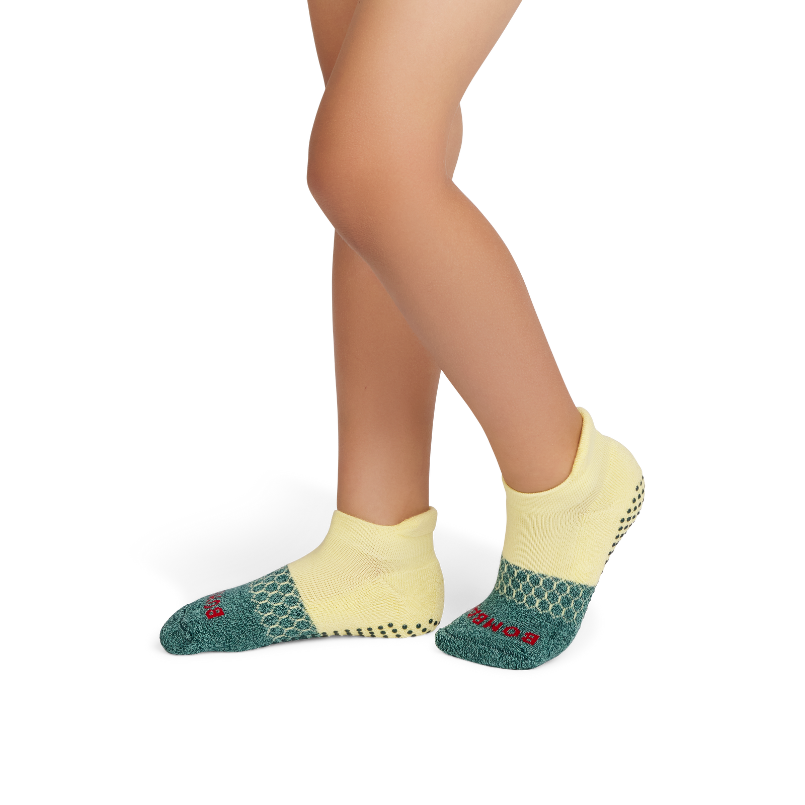 official-bombas::9824-celadon-paleyellow-junior-unisex-onmodel-2-transparent.png