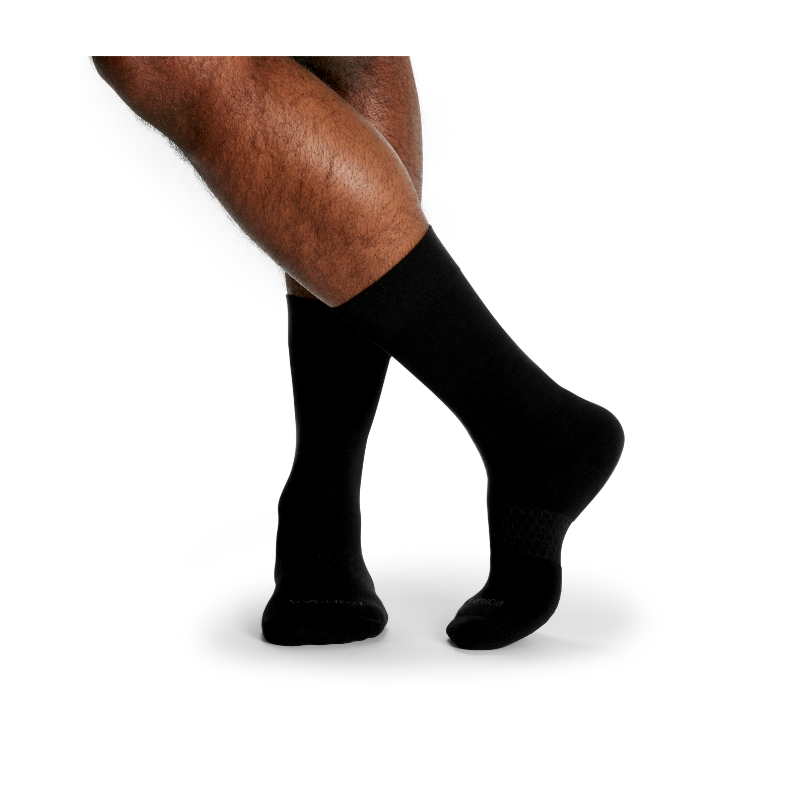 official-bombas::black-onmodel-2-transparent_07e4b3ea-3eaf-4c7a-b12e-c82e39e068df.png